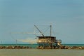 Balancing fishing hut at the river mouth Royalty Free Stock Photo