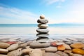 Balancing pebbles on a wooden beach surface, epitomizing Zen serenity