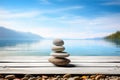 Balancing pebbles on a wooden beach surface, epitomizing Zen serenity