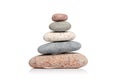 Balancing pyramid of stones isolated on white background