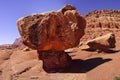 Balancing rock on tiny pedestal Royalty Free Stock Photo