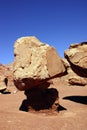 Balancing rock on tiny pedestal Royalty Free Stock Photo