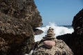 Balancing Rocks in front of ocean waves Royalty Free Stock Photo