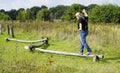 Balancing senior man on fitness track Royalty Free Stock Photo