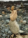 Balancing stone art on a beach