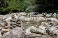 Balancing stones on the mountain river Royalty Free Stock Photo