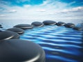 Balancing stones on the sea surface