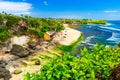 Balangan beach Bali Indonesia / Azure beach with rocky mountains and clear water of Indian ocean at sunny day Royalty Free Stock Photo