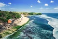 Balangan beach Bali Indonesia / Azure beach with rocky mountains and clear water of Indian ocean at sunny day Royalty Free Stock Photo