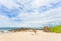 Balapitiya, Sri Lanka - A woman walking towards the beach of Balapitiya