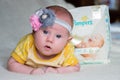 Balashiha, Russia - May 19, 2016, Girl next to the Pampers diaper pack