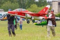 Balashikha, Moscow region, Russia - May 25, 2019: Team members of Aviation Sports Club RusJet carry a RC model of Russian jet