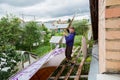 Balashikha, Russia - July 16, 2020, Installation of a new polycarbonate roof Royalty Free Stock Photo