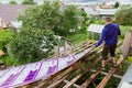 Balashikha, Russia - July 16, 2020, Installation of a new polycarbonate roof Royalty Free Stock Photo