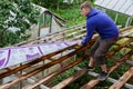 Balashikha, Russia - July 16, 2020, Installation of a new polycarbonate roof. Royalty Free Stock Photo