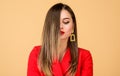 Balayage hair color technique. Pretty woman makeup face red lips. Woman wear glamorous earrings. Hairstyle and Royalty Free Stock Photo