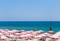 The Balchik seaside, beach with sands, sun umbrellas and blue wa