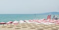 The Balchik seaside, beach with sands, sun umbrellas and blue water