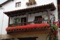 Balcony with flowers of tipical house in Santillana del Mar