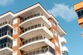 Balconies and blue sky with clouds. Part of a residential building in Turkey. Modern apartment buildings on a sunny day Royalty Free Stock Photo