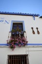 Balconies filled with flowers in spring, CÃÂ³rdoba, Spain Royalty Free Stock Photo