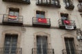 Balconies with flags in the city of Huesca.