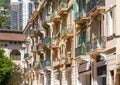 Balconies of old historic Mediterranean tenement houses. Royalty Free Stock Photo