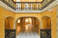 The balcony and the arches illuminated by the sun Marble stairs