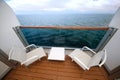 Balcony with chairs table on ship