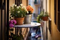 balcony with close up of a wrought iron table and potted flowers