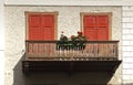 Balcony with flowers, Cortina dAmpezzo, Italy Royalty Free Stock Photo