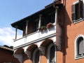 Balcony with flowers in the Garbatella district to Rome in Italy.