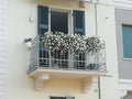 Apartment with beautiful balcony and shutters good neighbourhood  residential properties Royalty Free Stock Photo