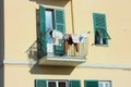 Terrace is used to hang clothes in a normal family home.