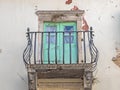 Balcony with iron balustrade at an old house in Croatia Royalty Free Stock Photo