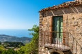 Balcony of an old house with view on the mediterranean sea, Sicily, Italy Royalty Free Stock Photo