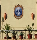 Balcony With Plants And Religious Picture In Faro Portugal