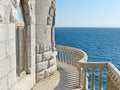 Balcony and sea views. Swallows nest-Gothic castle over the cliff of the sea, the emblem of the southern coast of Crimea. Royalty Free Stock Photo