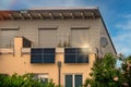 Solar power plant on a balcony with sunlight reflection and special lens flare light effect. Royalty Free Stock Photo