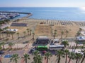 Balcony view over the Palm trees promenade, bus station, sea and port in Larnaca town