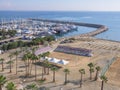 Balcony view over the Palm trees promenade, bus station, sea and port in Larnaca town Royalty Free Stock Photo