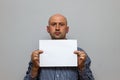 Bald business man is posing with blank copy space Royalty Free Stock Photo
