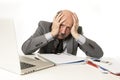 Bald business man 60s working stressed and frustrated at office computer laptop desk looking tired Royalty Free Stock Photo