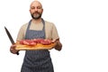 Bald butcher holding wooden cutting board with two fresh strip loin steaks. Meat industry. White isolated background. Prime cut of