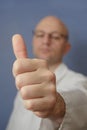 Bald doctor showing thumbs up. Royalty Free Stock Photo