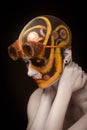 Bald girl with a art make up and steampunk glasses Royalty Free Stock Photo