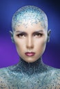 Bald girl with colorful make-up art. Royalty Free Stock Photo