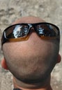 Bald Head Wearing Sunglasses