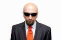 Bald man in dark glasses on white background, isolate, special agent, spy Royalty Free Stock Photo