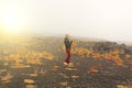 A bald man plays on a gold alto saxophone in the nature, against Royalty Free Stock Photo